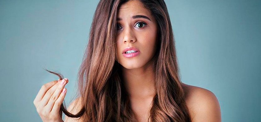 секущиеся волос у девушки